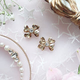 【7/15(水)21時発売】ビジューハートリボンピアス・イヤリング/シャンパンゴールド